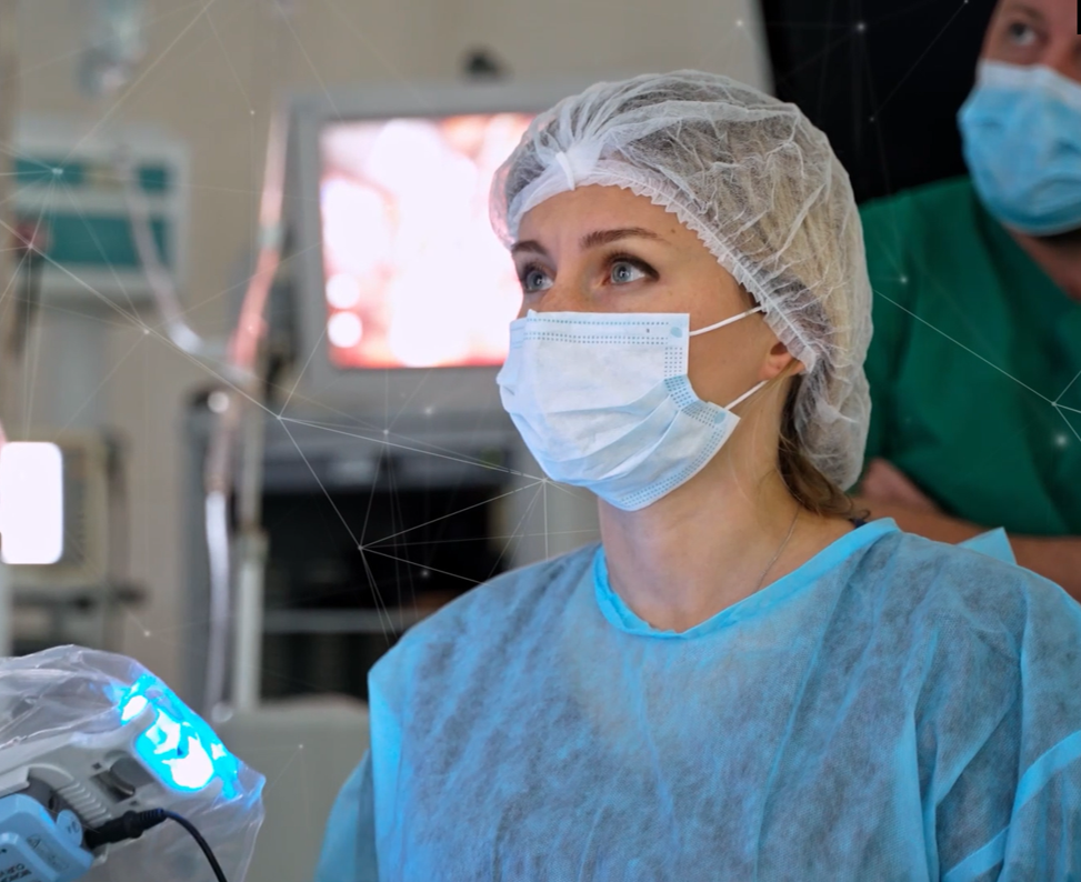 Doctor looks at a screen in the operating room