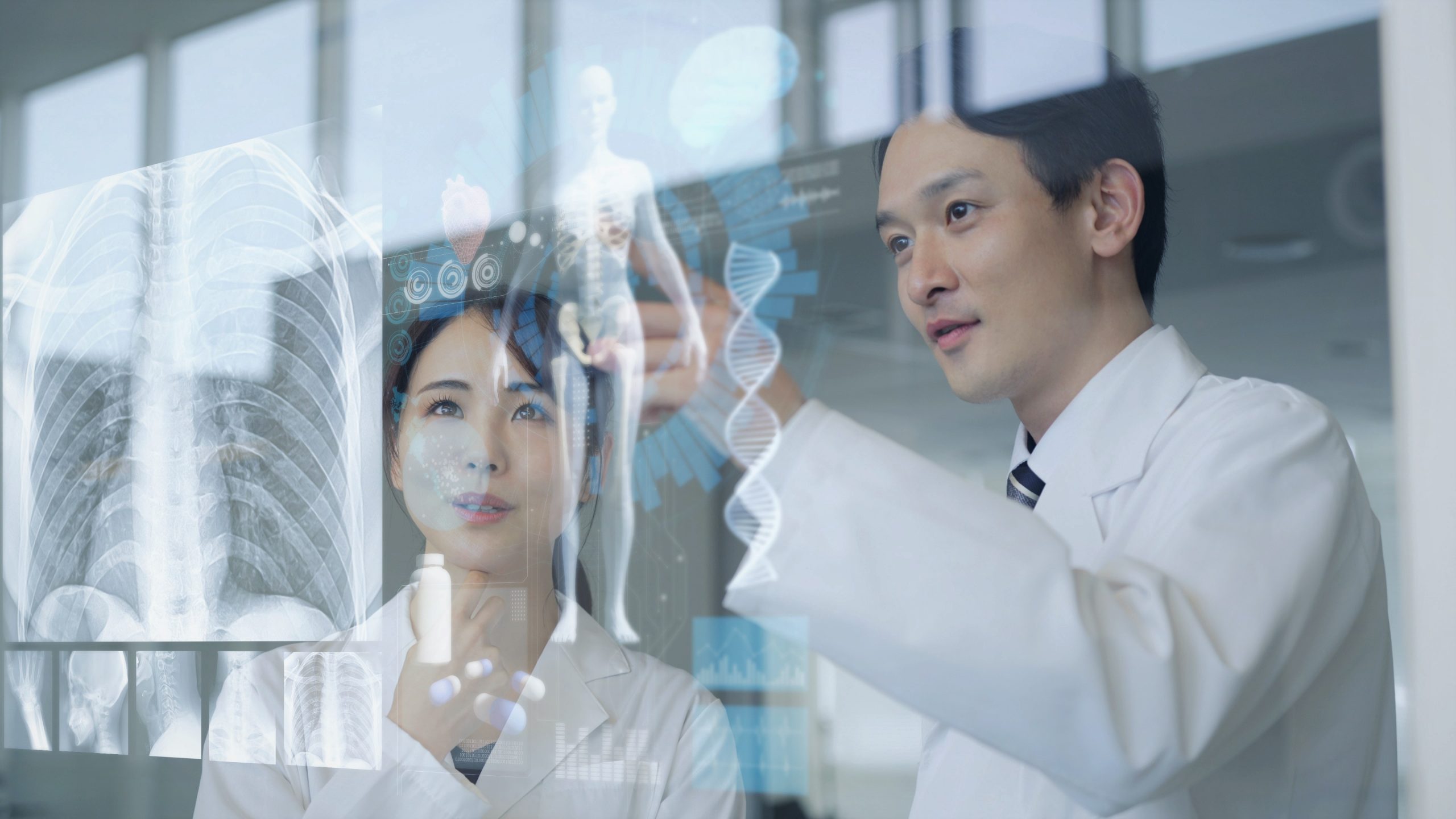 two doctors working on a virtual board