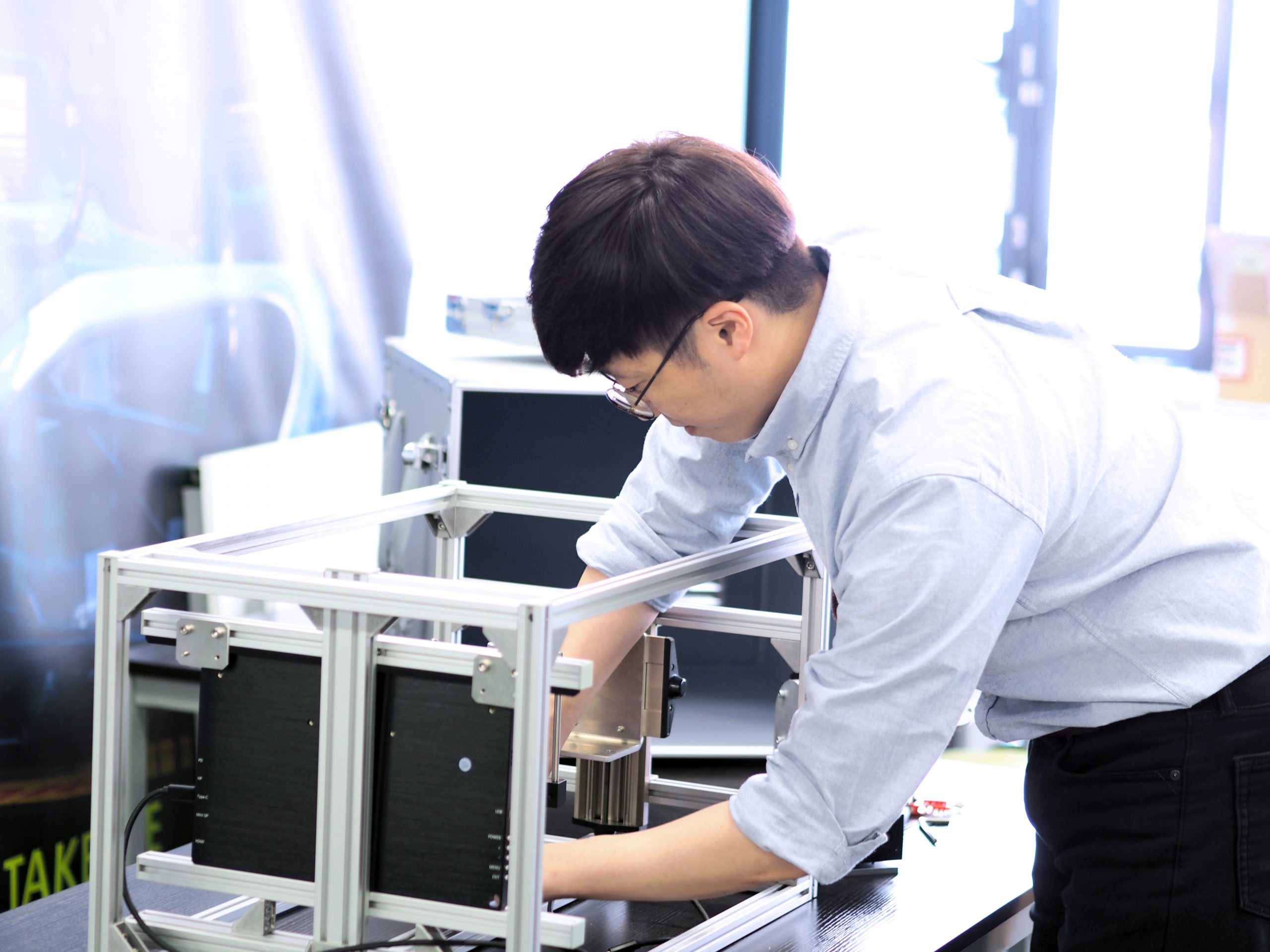 engineer working on a testing set-up Computer vision end of line testing